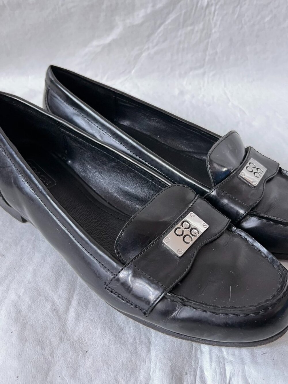 Coach loafers Hollee black leather moc toe slip on shoes 8.5 silver logo flat